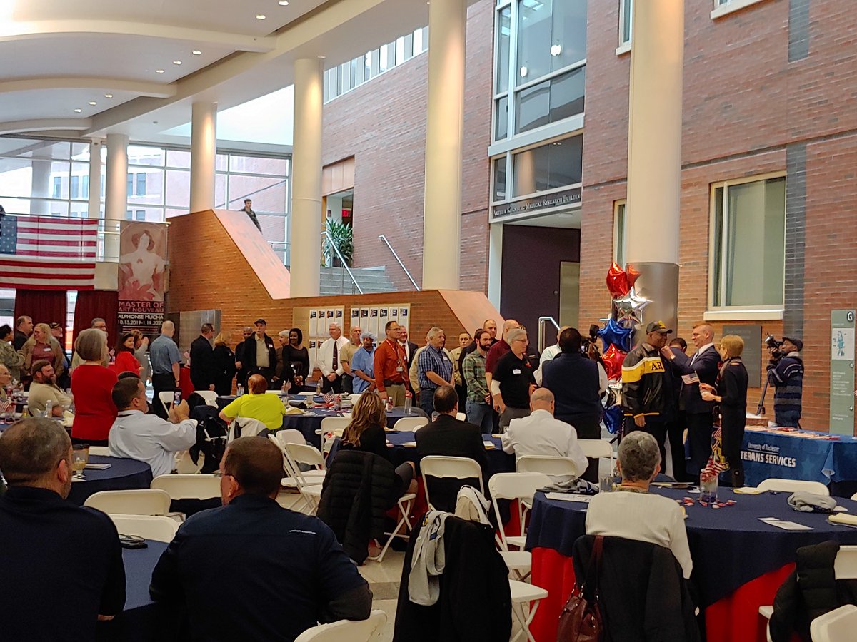 ChrisFSchmidt's tweet photo. Line of veterans waiting for their pin of recognition @UofR. Thank you for your service! #NeverForget #veteransday2019 https://t.co/qsiCa760cS