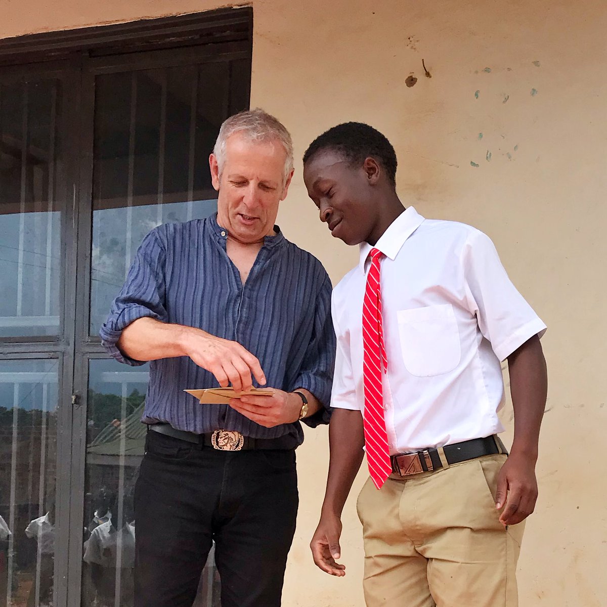 pmhildreth's tweet photo. and the kids had a surprise for me - in the form of a presentation. Every one had written a card #VX #VXSport #NewSport #BallSport #InnovativeSport #Africa #Uganda #VXAfrica #VXUganda https://t.co/PkpTsDFpSV