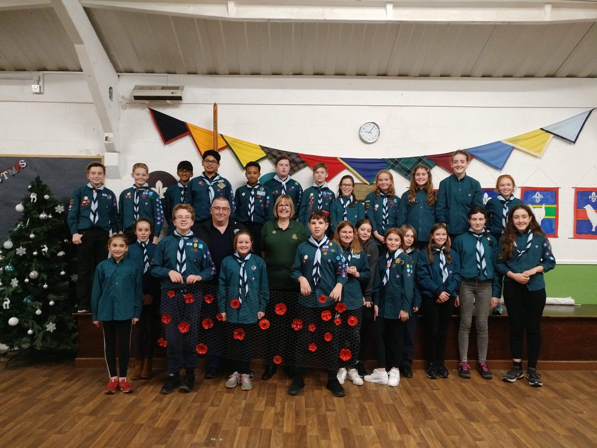 TraffordVetsUK's tweet photo. Tonight two of our Veterans visited 14th Sale Scouts as they were making Poppies out of the bottom of plastic bottles.
They both gave a short talk about their service and then helped them make the Poppies.
A totally enjoyable evening thanks to them for  inviting us. https://t.co/cAEXmHc0m0