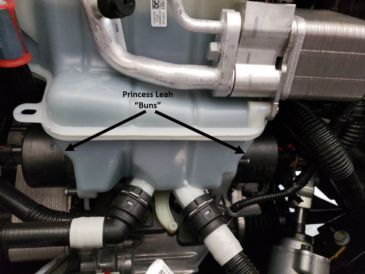 IheartTesla's tweet photo. I got a behind the scenes look at my @Tesla while the mobile technician was installing my Homelink. @elonmusk has a great sense of humor with the Super Coolant Cape and Leah Buns. https://t.co/m800BYXNXP