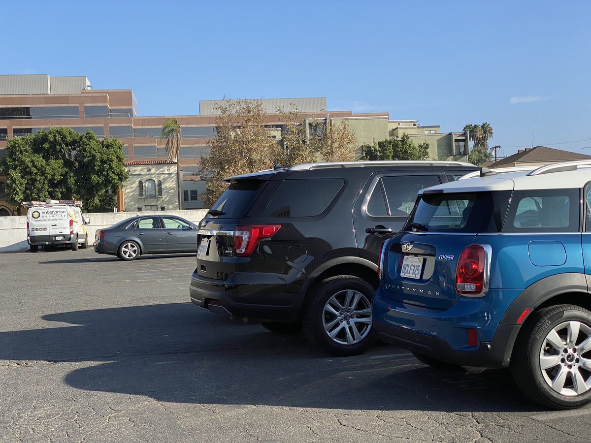 analydiamonaco's tweet photo. There was about ten parking spaces between my car (Countryman) and the last car (in this row)... and yet, the monster driving the basic ass SUV made a conscious decision to park next to my car... EXTREMELY close. 
#laparking https://t.co/Jn9uqvErm1
