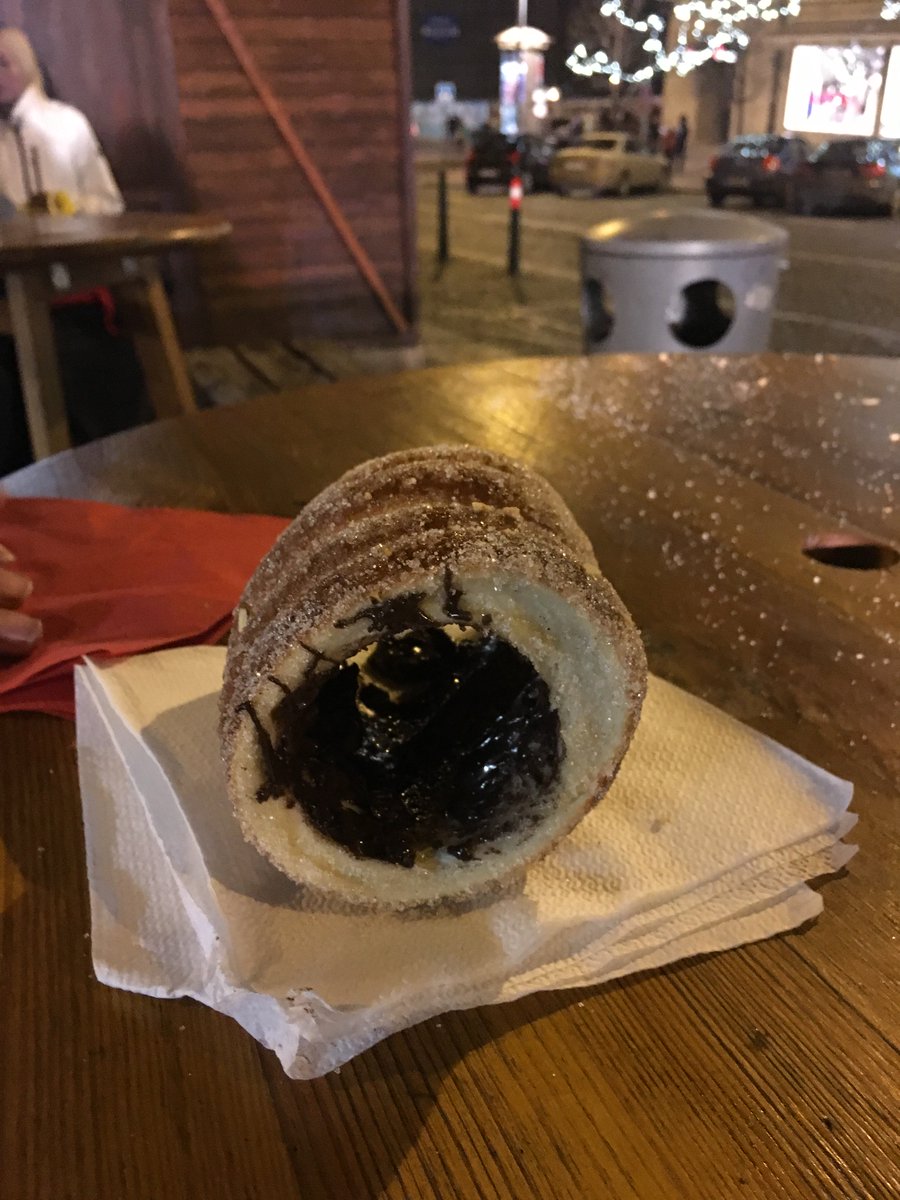 UniworldCruises's tweet photo. A6. Kürtöskalács in Budapest! Perfectly bready and just slightly sweet, these horn-shaped cakes are rolled in cinnamon sugar and served right off the fire at Hungarian market stalls. #TBINchat #ExploreUniworld https://t.co/W3vlCSr1HG