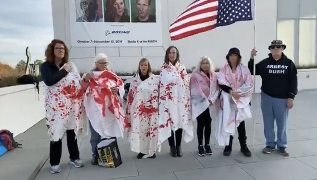 codepink's tweet photo. CODEPINK activists stood out in front of @kencen today in protest of their display of George Bush’s artwork.
By showing his paintings, which depict veterans harmed in Bush’s own wars, the Kennedy Center is artwashing his war crimes & normalizing civilian deaths. #StopArtwashing https://t.co/SBz01C2cqj