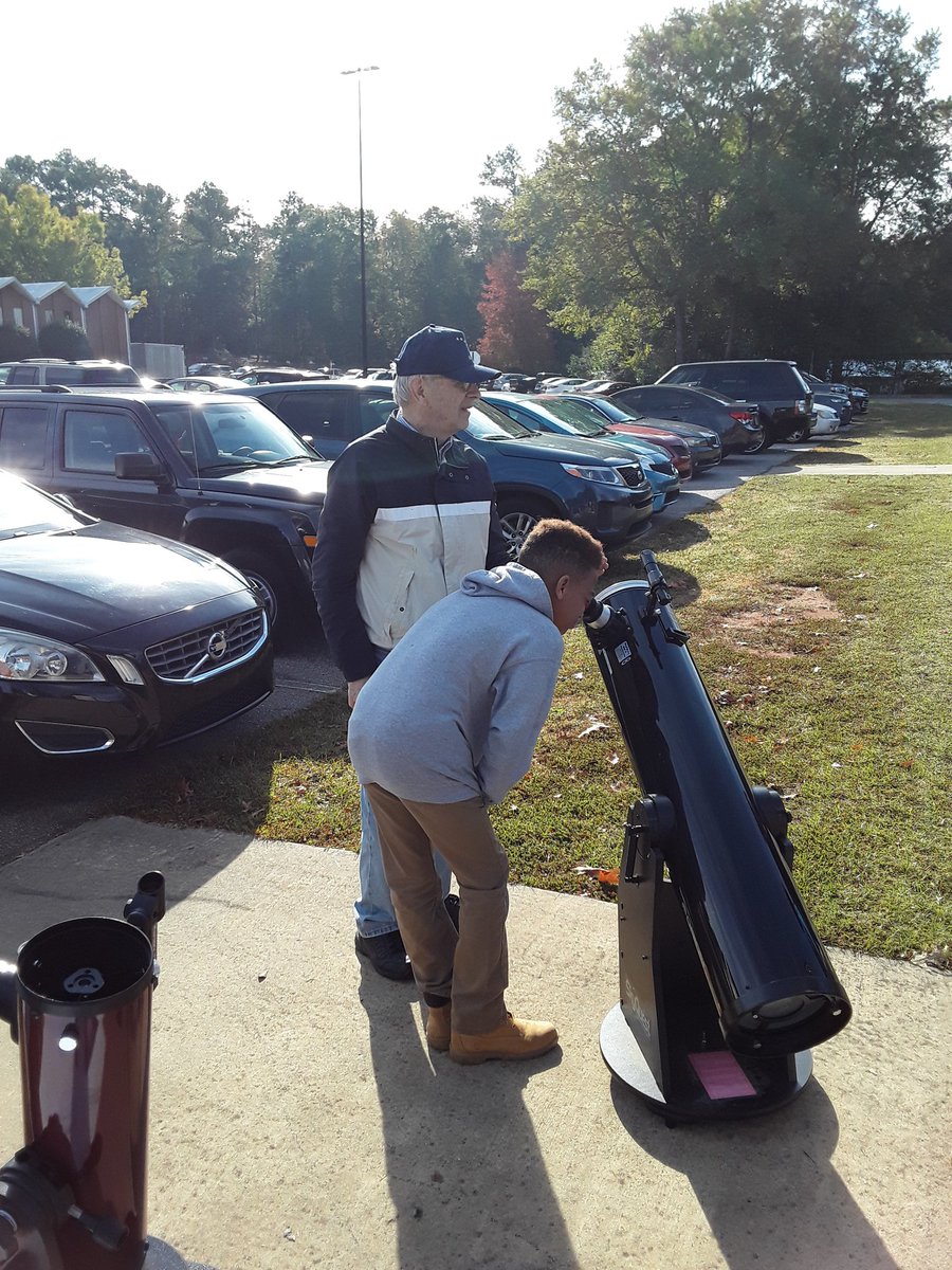Wow, just wow!  Thanks to an amazing community volunteer scientist, Dr. Snook, many of our 6th graders had the opportunity to view something really special today which can't be seen again until 2032: The Transit of Mercury. #handsonlearning #lookskyward  #transitofmercury