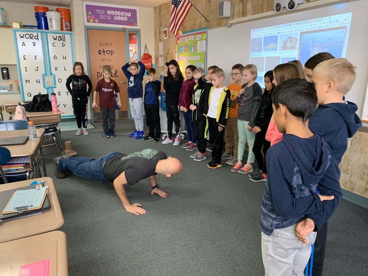 stephsargent44's tweet photo. Celebrating Veteran’s Day with Mike the Marine! We asked lots of great questions, had a quick geography lesson, and even challenged ourselves to a push-up competition! @martinhusky158 https://t.co/p3RbPS0SZR