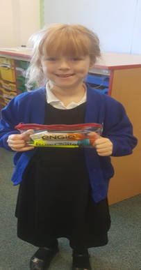 Our KS1 winner who won a prize for the 'Stand Out and be Seen' day for the brightest dressed.