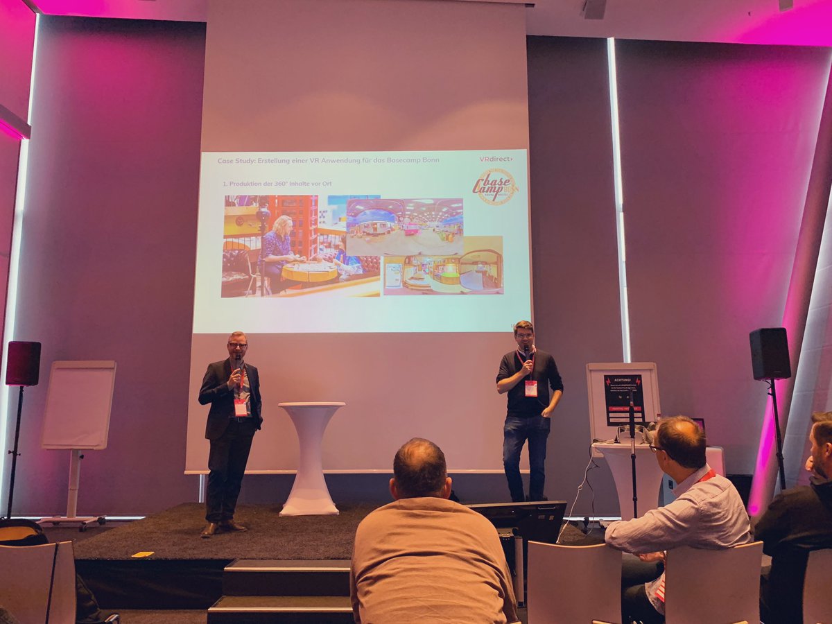 digitalhub_de's tweet photo. Rolf Illenberger @VRdrct und Thomas Lenz sprechen über den Einsatz von Virtual Reality im @BaseCampBonn #BizBonn19 https://t.co/oYo8xjPE8B
