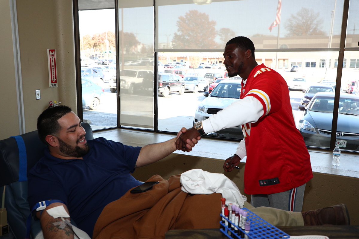 KCChiefs_Matt's tweet photo. Morris Claiborne and a couple of Chiefs Cheerleaders stopped by the Community Blood Center this afternoon as part of the 22nd annual Chiefs Kingdom Blood Drive.
This week-long event collected more than 8,200 units of blood last year. Awesome stuff.
#ChiefsHuddlefor100 https://t.co/8q3ksi8Tbx