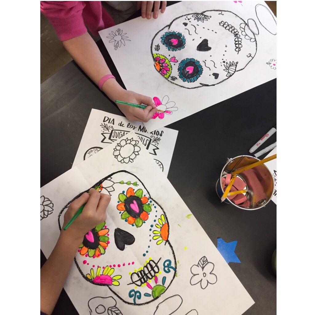 #4thgraders started painting their #sugarskulls today using #neon colors. How much fun are they? #mexico #traditions