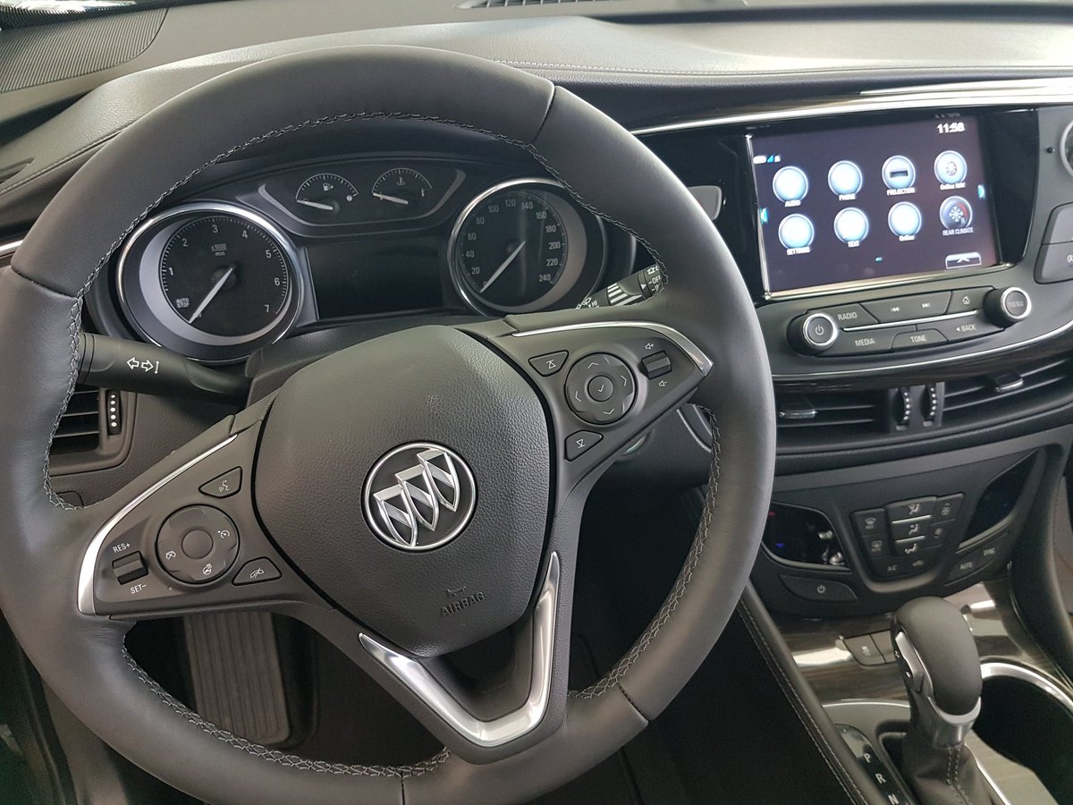 CraigDunnGM's tweet photo. The driver's seat of the 2019 Buick Envision is a great place to be on a cold winter day.  Heated leather seating, heated seating wheel, trizone Climate control and a panoramic sunroof to enjoy the sunshine!  Come and test drive the Envision today! #craigdunnmotorcity #buick https://t.co/ZGuu3OTu52