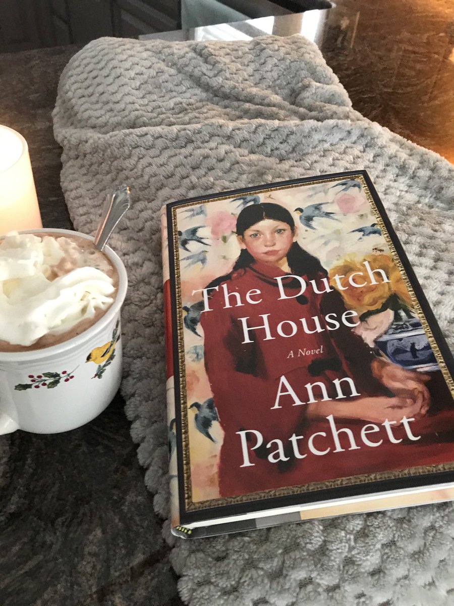 Curling up with a good book and hot cocoa on this surprise, snowy day.