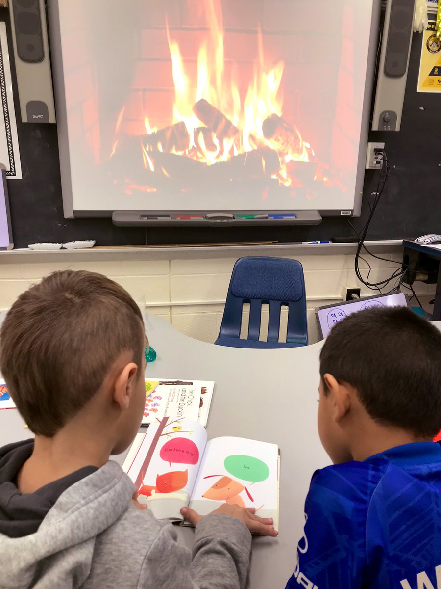 MeganScotto's tweet photo. Reading by a fire is cozy and makes the first freezing day a little better. Students were able to share the strategies they used when stuck on a tricky word with a partner. #readingforunderstanding #ProfileOfARamseyGraduate @TisdaleSchool https://t.co/yGwYsaOb53