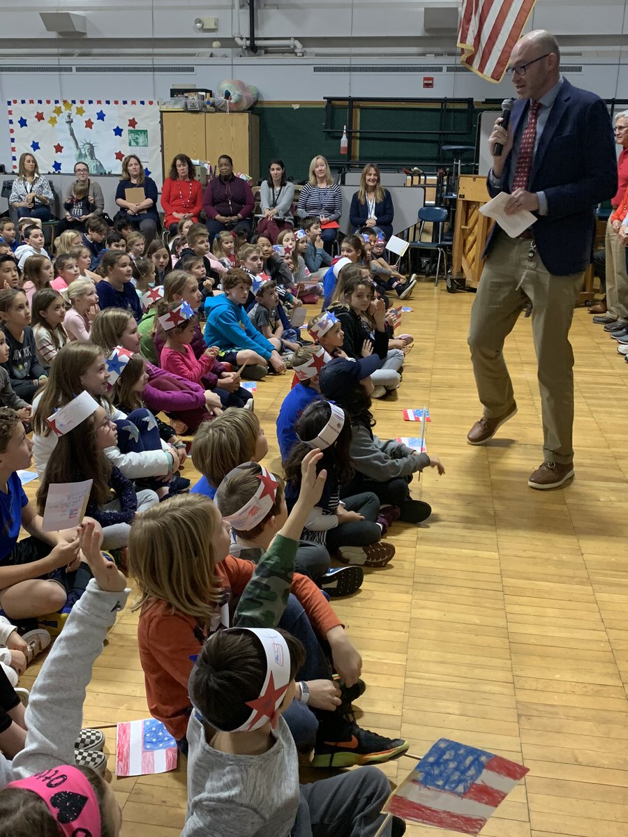 FfldOsborn's tweet photo. OHS honored our veteran guests today with song, applause and a special flag gift!  When our guests were asked by a student, “How do you stop a war”, Army veteran Tom Quinn replied, “Don’t start one.”  Thanks to all who participated (including Mr. H’s father)! https://t.co/ObUo8kQ0wB