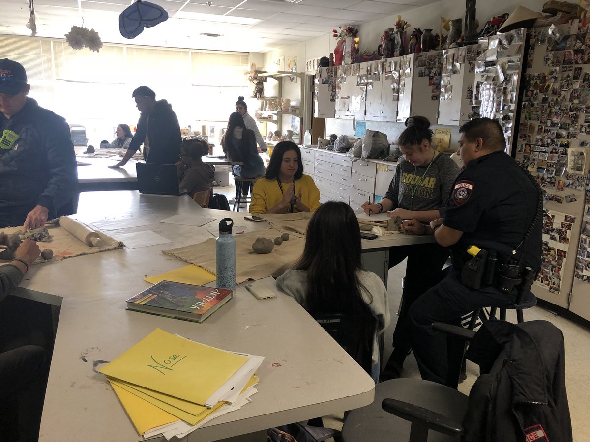 TimE_Baxter's tweet photo. TCHS Art Ceramics Classes celebrate first responders by interviewing and then making clay busts of the officers! This was a special time for our students and officers! Great work, TCHS Art! @TheColonyHS https://t.co/h7WJtNccD0