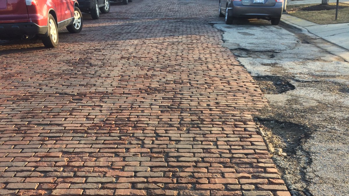 Pres_Chicago's tweet image. Ever notice that you never see patches on brick paved streets? (unless it's asphalt)

That's because brick pavers can easily be removed and stacked.

So underground utility or roadbed work can be completed.

Then the brick pavers can be reset

and it looks like it never happened.