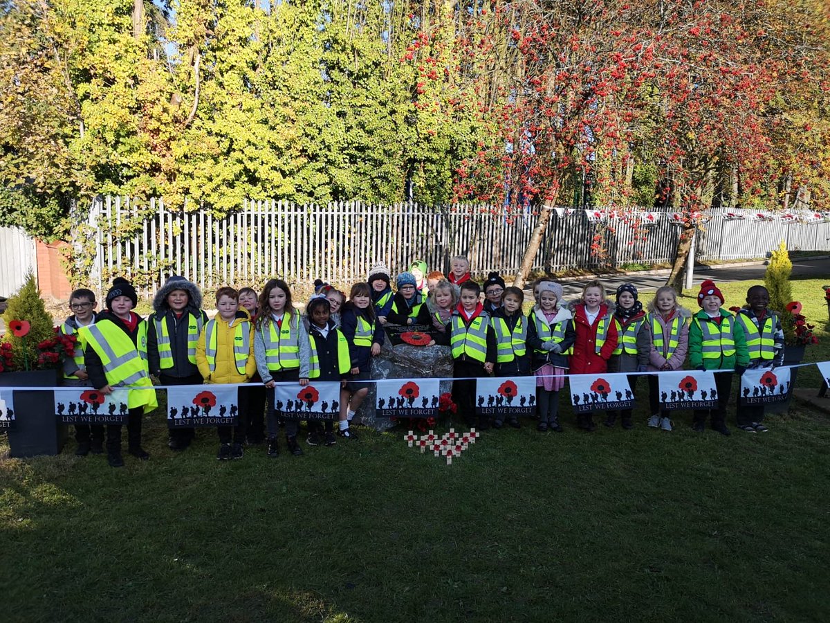 HalfwayYearTwo's tweet photo. 🌺On Friday we walked down to the village to pay our respects and laid our fingerprint painted wreath. When we were there we got to meet Cllr Rob Evans and he allowed us to help him put up the flags. He was very pleased to see us visiting the memorial garden🌺 https://t.co/phqaDn4ozL