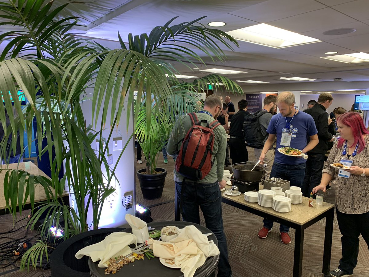 @QConSF goes the extra mile for attendees. One of of the three levels of the conference venue has no windows. So what do we do?  Living green wall, full spectrum day lighting, and huge plants.  #qconcares #qcon #qconsf