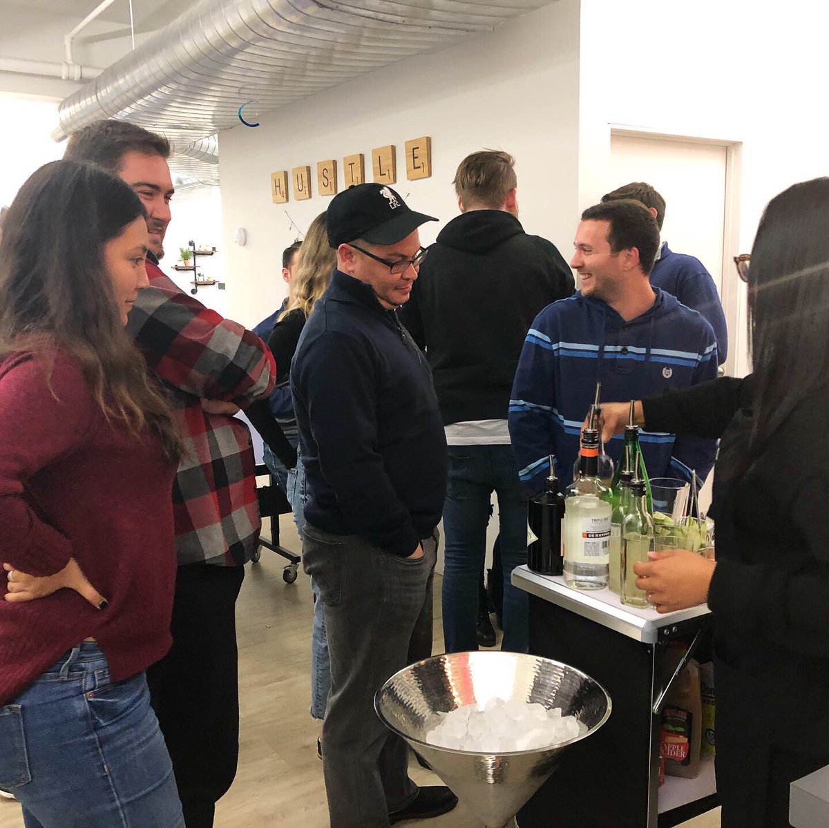 TheMinute_Group's tweet photo. Celebrating #NationalHappyHourDay with in-office bartender service and specialty cocktails! #CultureIsOurCore https://t.co/XNtAwIte1k