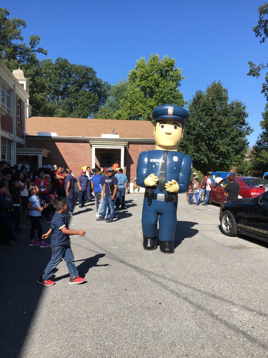 Here's another outreach effort: police officers came to a Guatemalan mobile consulate event in Memphis in September and had a person in a giant inflatable police costume interact with the crowd.