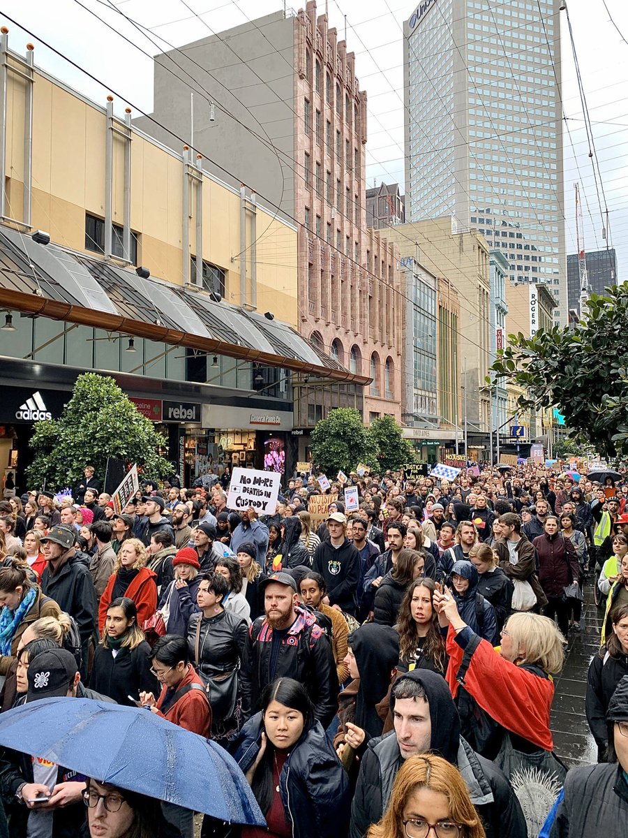 Marching up Bourke St now, crowd stretches as far as I can see. Too many coppers, not enough justice!  #JusticeForWalker  #IstandwithYuendumu  #BlackLivesMatter  