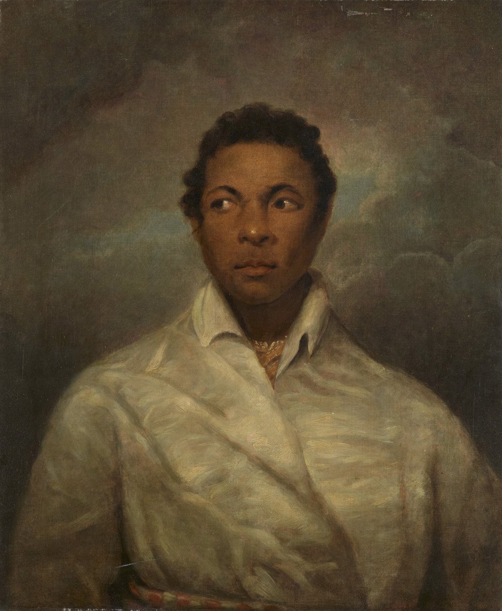 [image description: portrait of Ira Aldridge, dressed in a white wrap coat which is tied at the waist using gold and orange rope belt, Ira is facing the viewer, the focus of his gaze is to the left side of the painting]