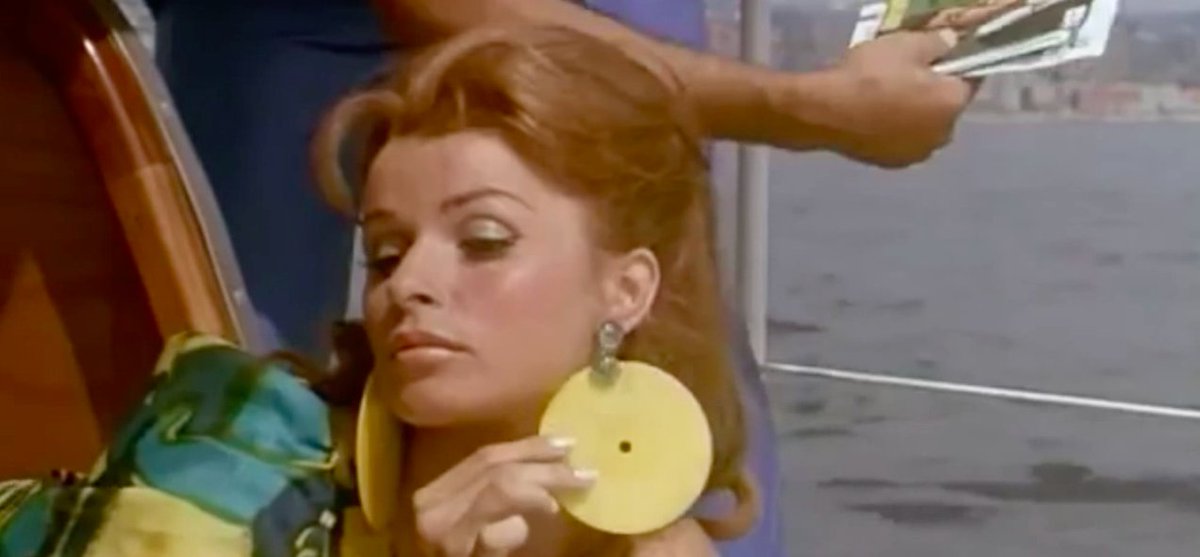 Senta Berger wearing vinyl records as #earrings like a boss is all we need ...