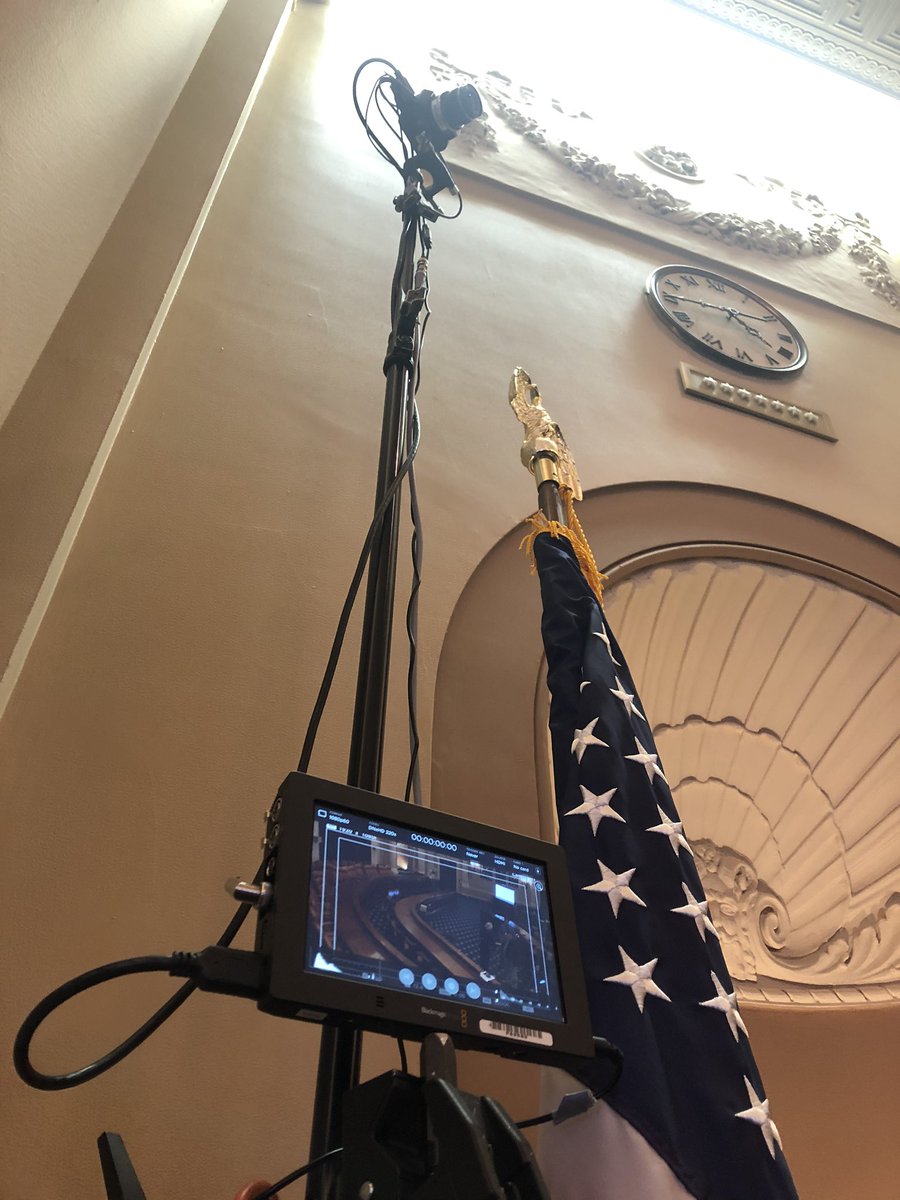 There are also two stationary high cameras to show panoramic views in the front and the back of the hearing room.