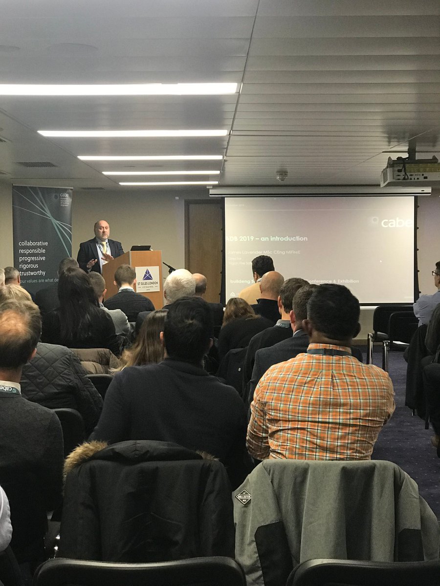 cbuilde's tweet photo. James Lavender (@FireTrigon) is welcomed to the stage to discuss Proposed Changes to #ApprovedDocumentB. James has 20yrs of working within the #FireSafety industry & started his career undertaking #FireResistance & reaction to fire tests at #ChilternInternationalFire.
#BuildEng https://t.co/UOuJaBK9wr