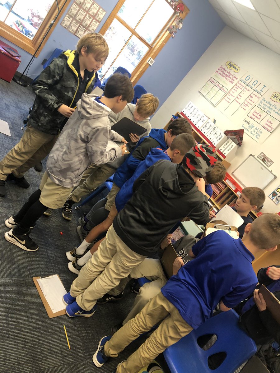 RuesCrew's tweet photo. We played trashketball to practice long division today - each student independently solved a problem on the bench, then huddled up to check answers, then a random student was chosen to shoot a basket  for their team! #mathisfun @PLPLowerSchool https://t.co/gvSZFjxvdu
