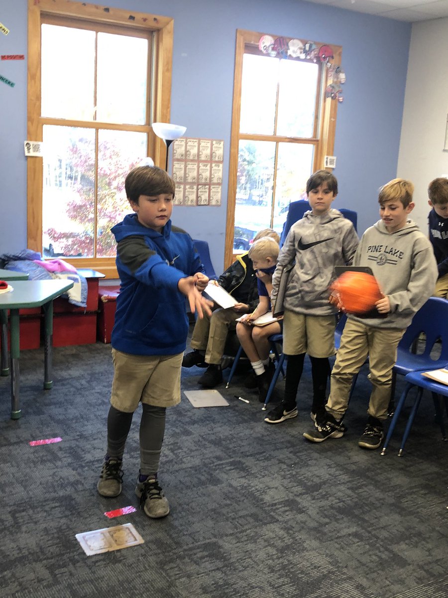 RuesCrew's tweet photo. We played trashketball to practice long division today - each student independently solved a problem on the bench, then huddled up to check answers, then a random student was chosen to shoot a basket  for their team! #mathisfun @PLPLowerSchool https://t.co/gvSZFjxvdu