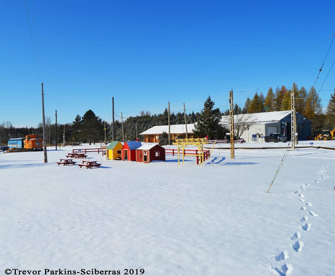 streetcarmuseum's tweet photo. Winter came early at the Halton County Radial Railway! The snow really makes the colors pop on the latest additions to our museum's collection. The museum is closed for the winter, but will reopen for 3 Christmas shows in December. https://t.co/P2wBXgfDX8