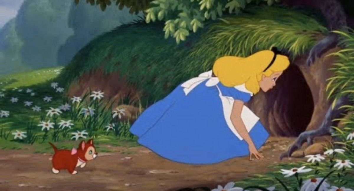 In Alice in Wonderland (which is a dream), Alice chases the white rabbit into a hole and falls down a tunnel into a room with a black and white checkered floor.