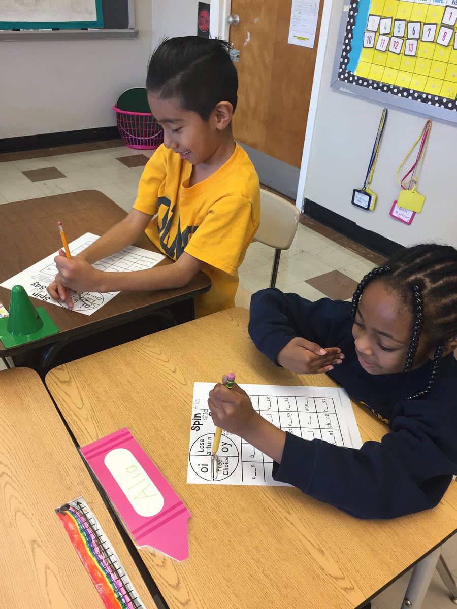 Today our 2nd graders are playing Spin and Say Bingo, a literacy game spinning paperclips to complete the words 5 in a row! #olmcbluenights #olmc #asburypark #asbury #njed #njeducation #education #bingo