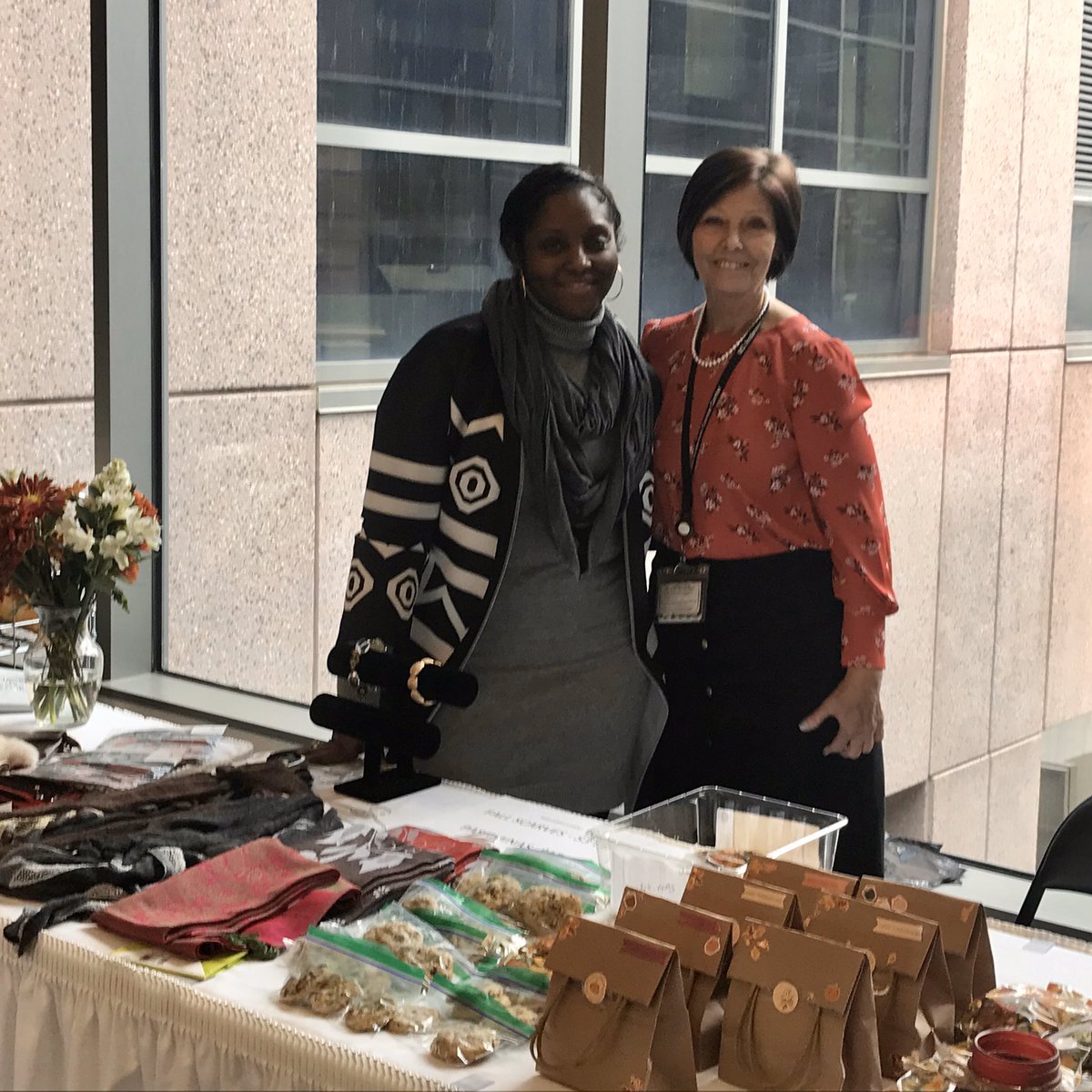 ERebelloMD's tweet photo. Come check out the yummy treats and cool merch from @MDAndersonNews #WMFI! Proceeds benefit Adopt-a-Family! @ELTravisPhD @DoctorDevan @netri_mehta @CarinHagberg https://t.co/SPf0k7nA6m