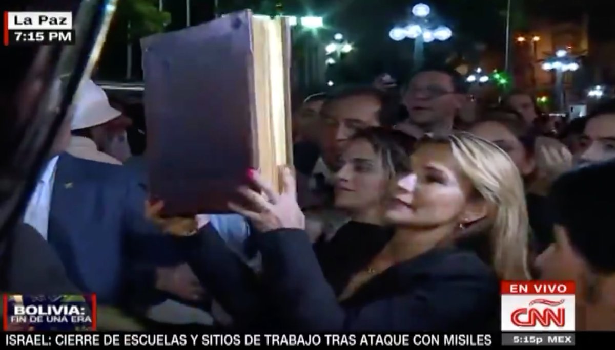 "The bible returns to the Palace," says Áñez.