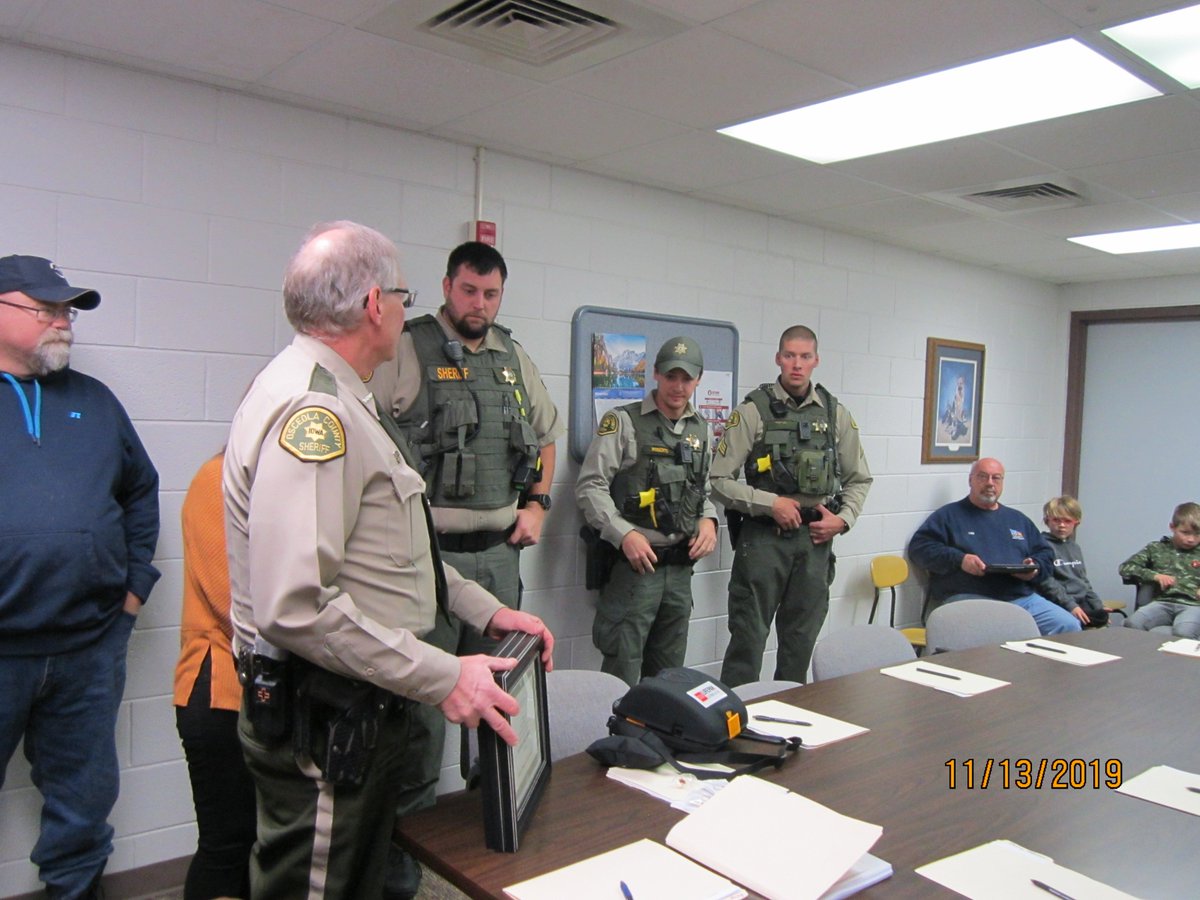 OCSOIowa's tweet photo. Sergeant Matt Julius and Deputies Zane Roberts and Tyler Bos were acknowledged for their roles in providing vital life saving measures to Sibley residents Gary Iedema and Charles Klaassen. https://t.co/Q4NeB3XcI4