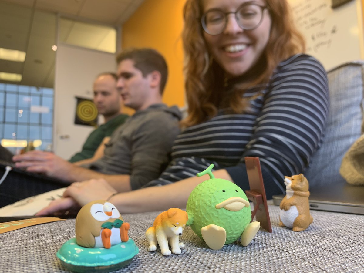 4 toys on couch with Monica in background