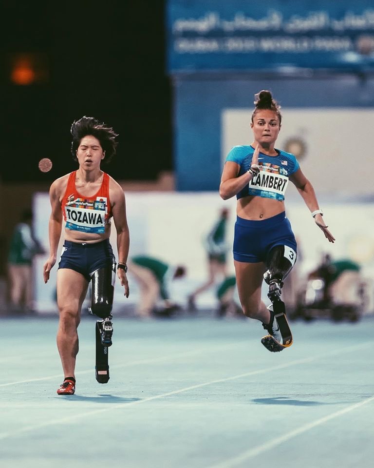 RiverHawkWLax's tweet photo. UMass Lowell alum Noelle Lambert finished in fourth place in the 100 meters at the Paralympic Games World Championships in Dubai today. Her time of 16.31 set a new American record!!⁣
⁣
Keep killin’ it out there Noelle 💪🏼⁣
⁣
#UnitedInBlue | #AEWLax https://t.co/9XjMyTyjve