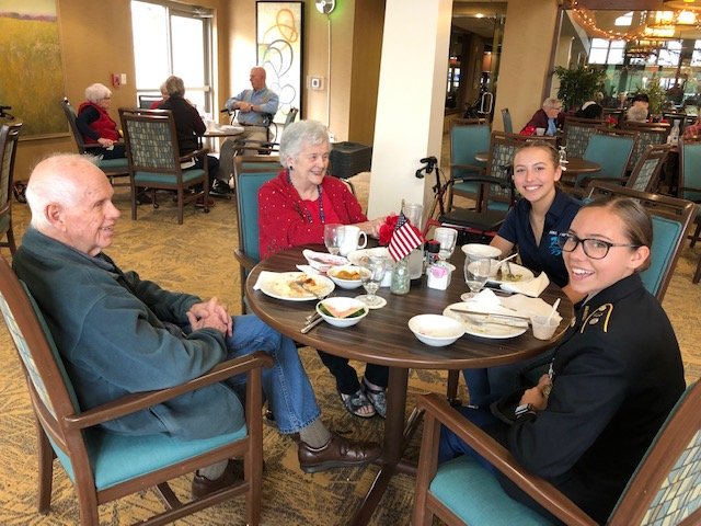 Johnson Jaguar Battalion cadets eat lunch with veterans at The Emerald Oaks Retirement Resort