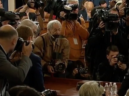 dpreview's tweet photo. Want to know who the real hero was today, during the first public impeachment hearing? This guy, that's who. #filmsnotdead #ImpeachmentHearings

Can anyone ID the photographer and / or camera? https://t.co/EmRdJB9k74