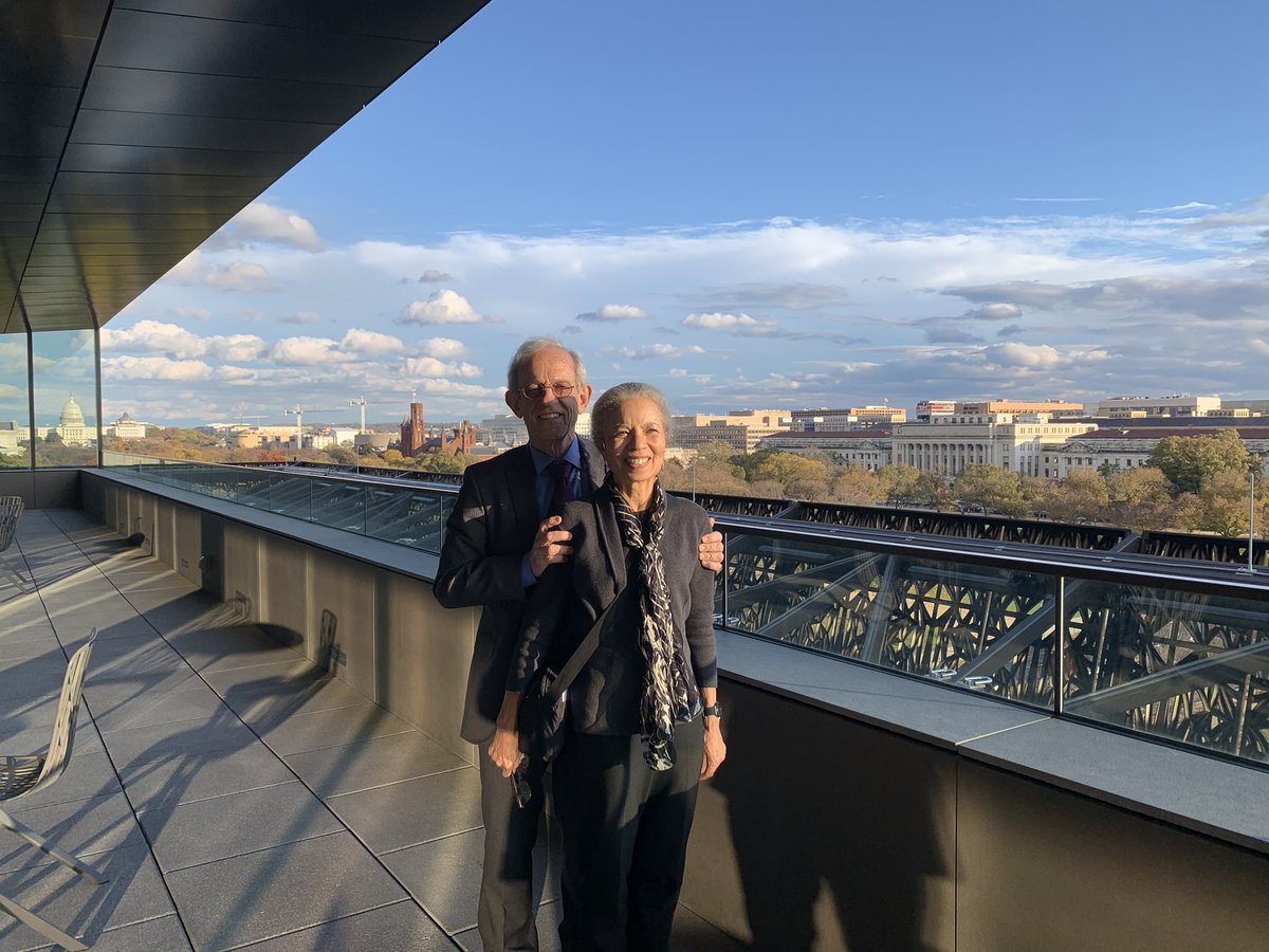 AdamSerwer's tweet photo. My Mom fled Jim Crow Florida with her family as a girl. Her and my Pop were married two years after the Loving decision. Yesterday I got to see Mom celebrate her retirement from the top of the Museum of African American History and Culture that she helped build. Love you mom. https://t.co/prZVCs5DB7