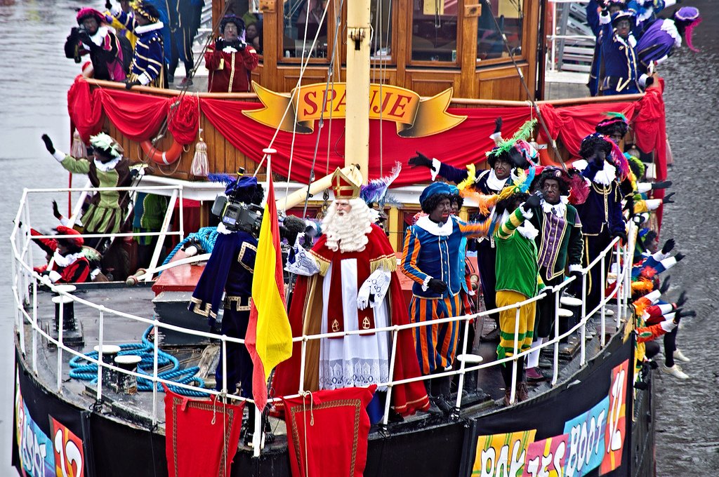 RoyKable's tweet photo. @JColeNC In the Netherlands there is this racist holiday tradition in December called Sinterklaas feest in wich white people dress up in full black face.This black face caricature is called Zwarte Piet (Black Pete) and arrives on a boat as a helper. Help us 2 stop this please! https://t.co/ldEyM7B7oP
