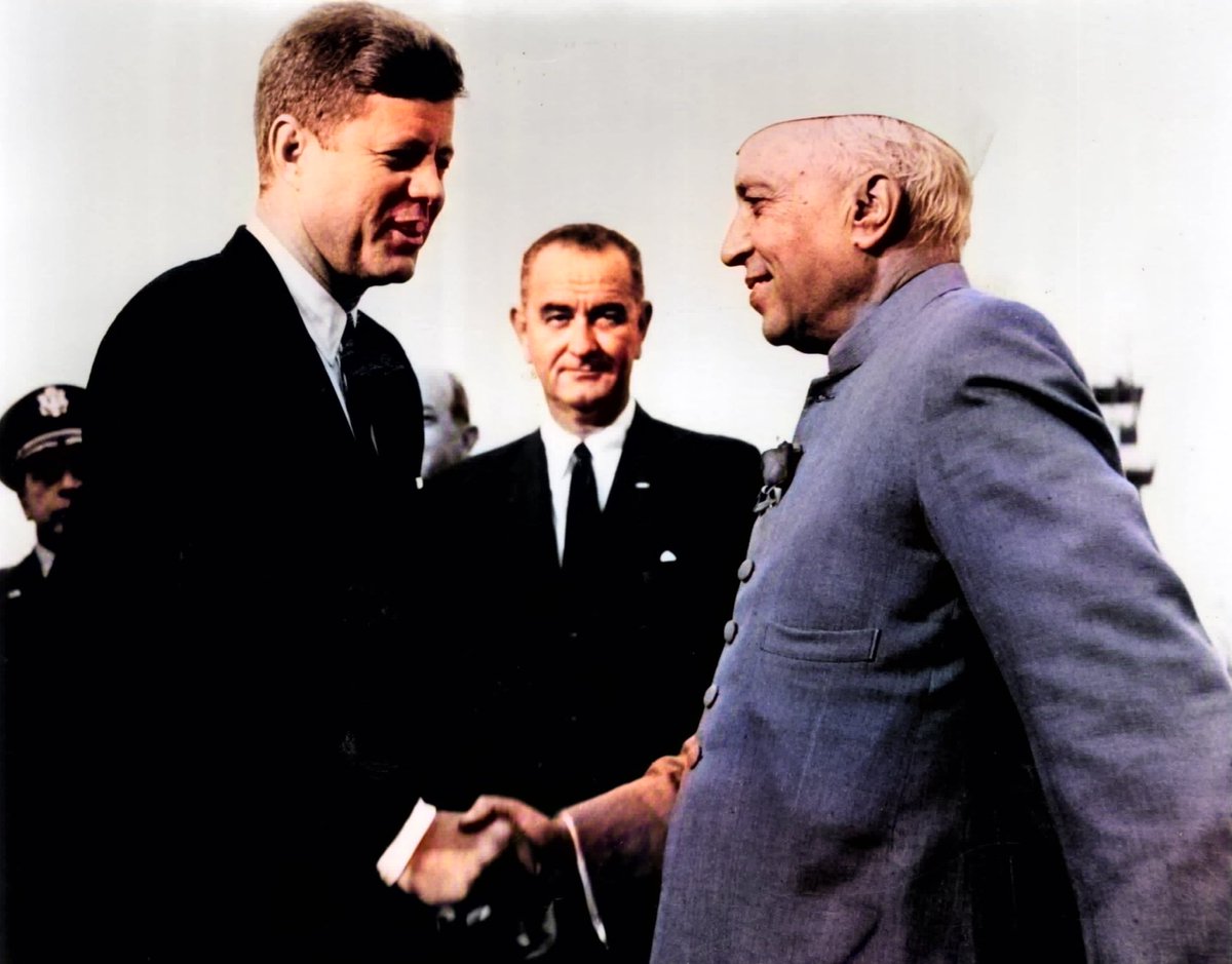 With JFK and a none-too-impressed LBJ