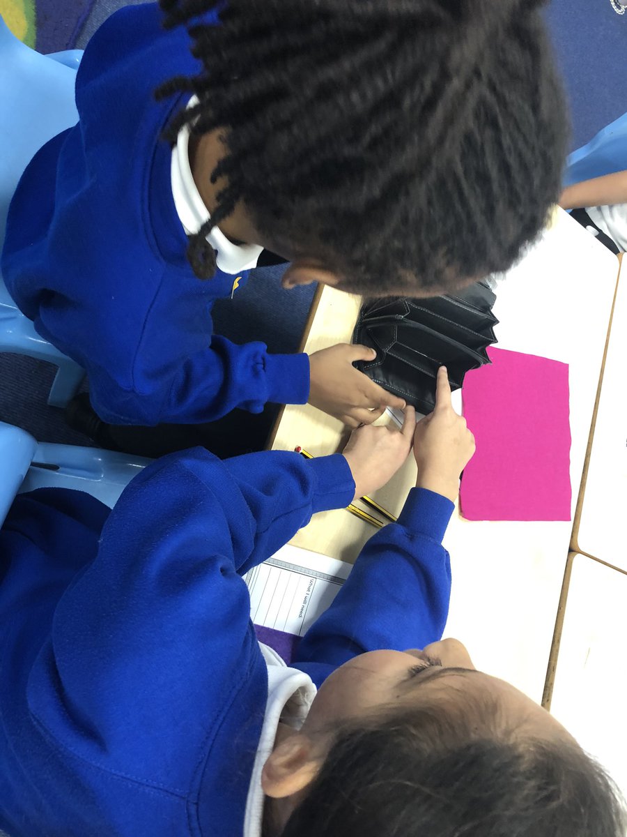 Class 10 looking at how purses are made