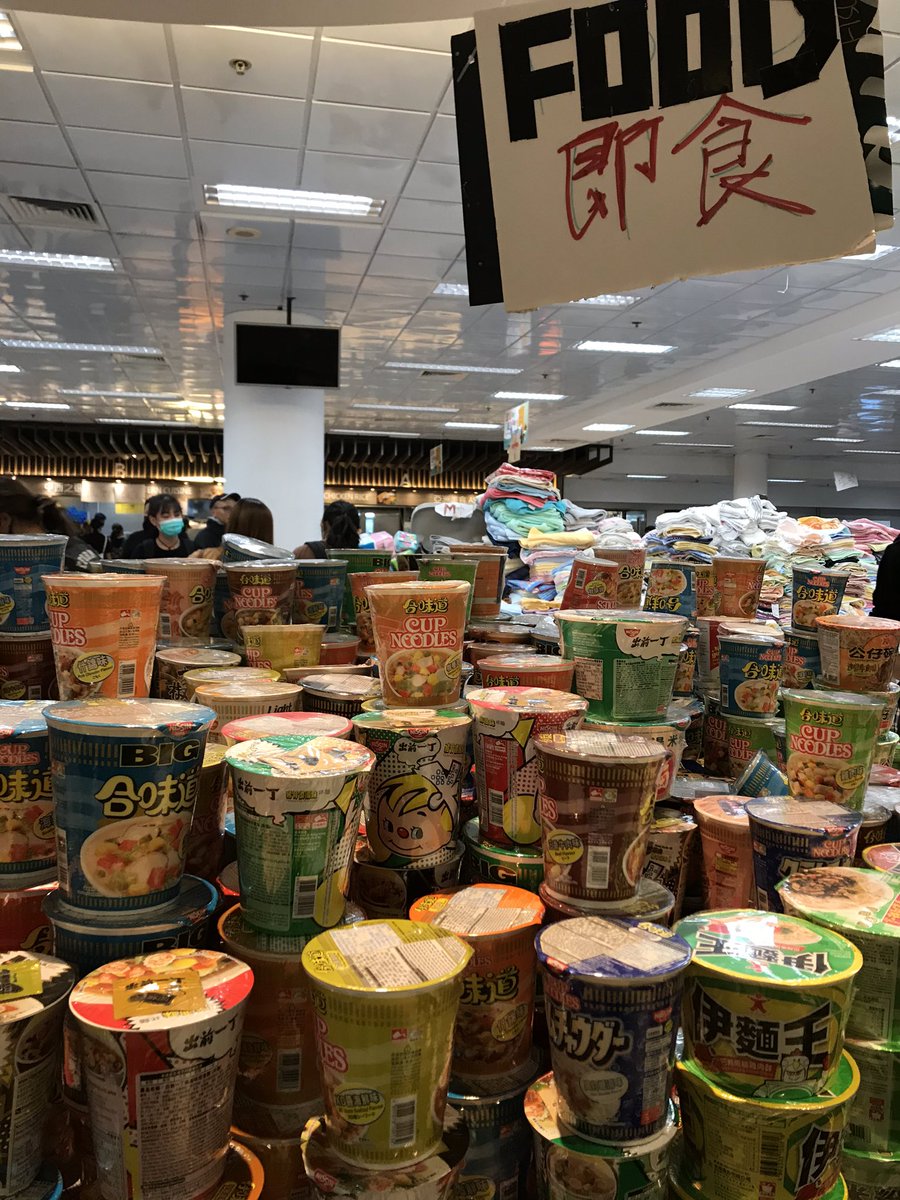 The distribution centre and “resistance canteen” has got even busier and more organised since last visit. There are aisles for water, dry goods, tools, daily items, clothing, fresh food and ready meals —and even treats “for the CUHK cats.”