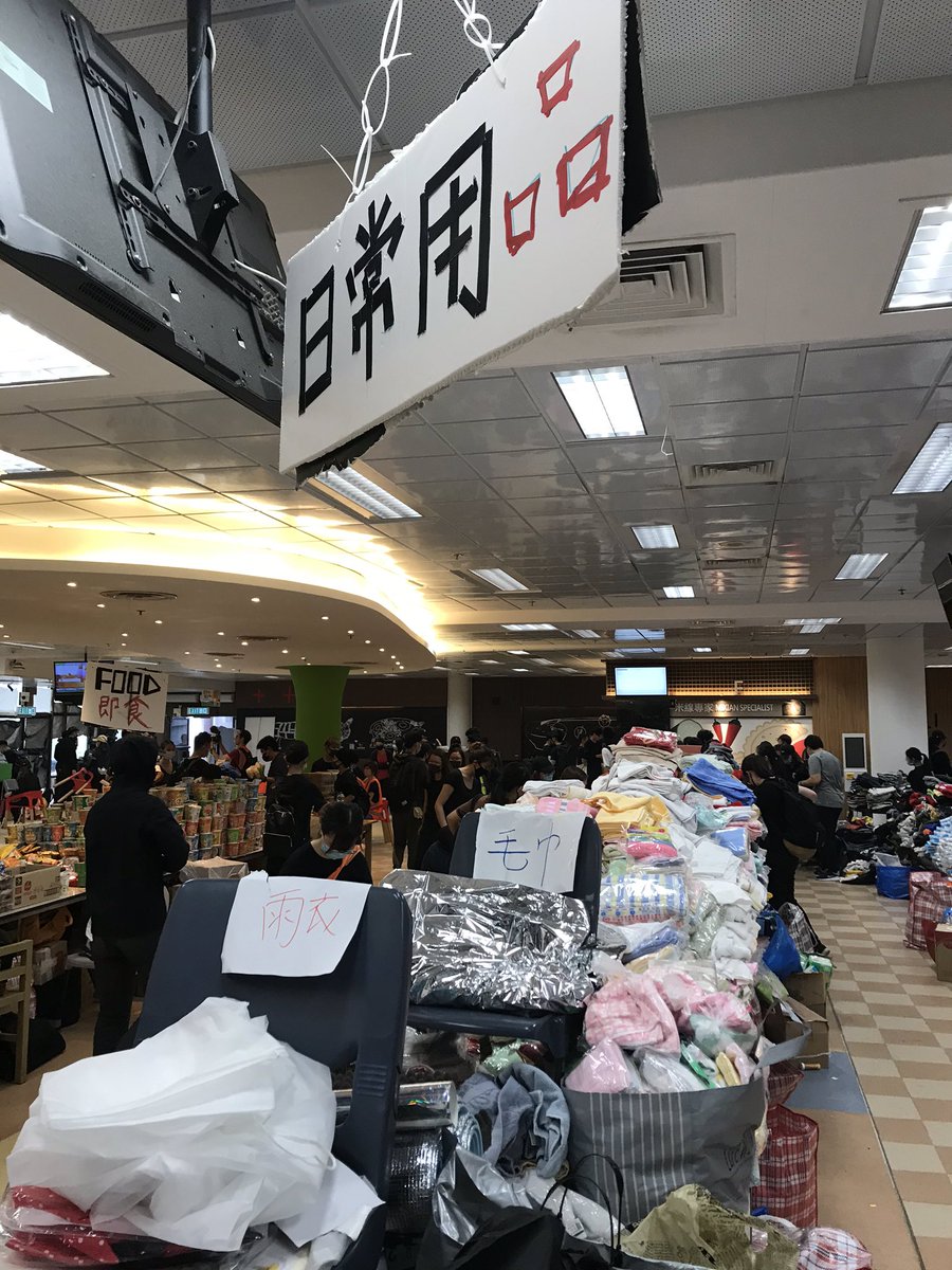 The distribution centre and “resistance canteen” has got even busier and more organised since last visit. There are aisles for water, dry goods, tools, daily items, clothing, fresh food and ready meals —and even treats “for the CUHK cats.”