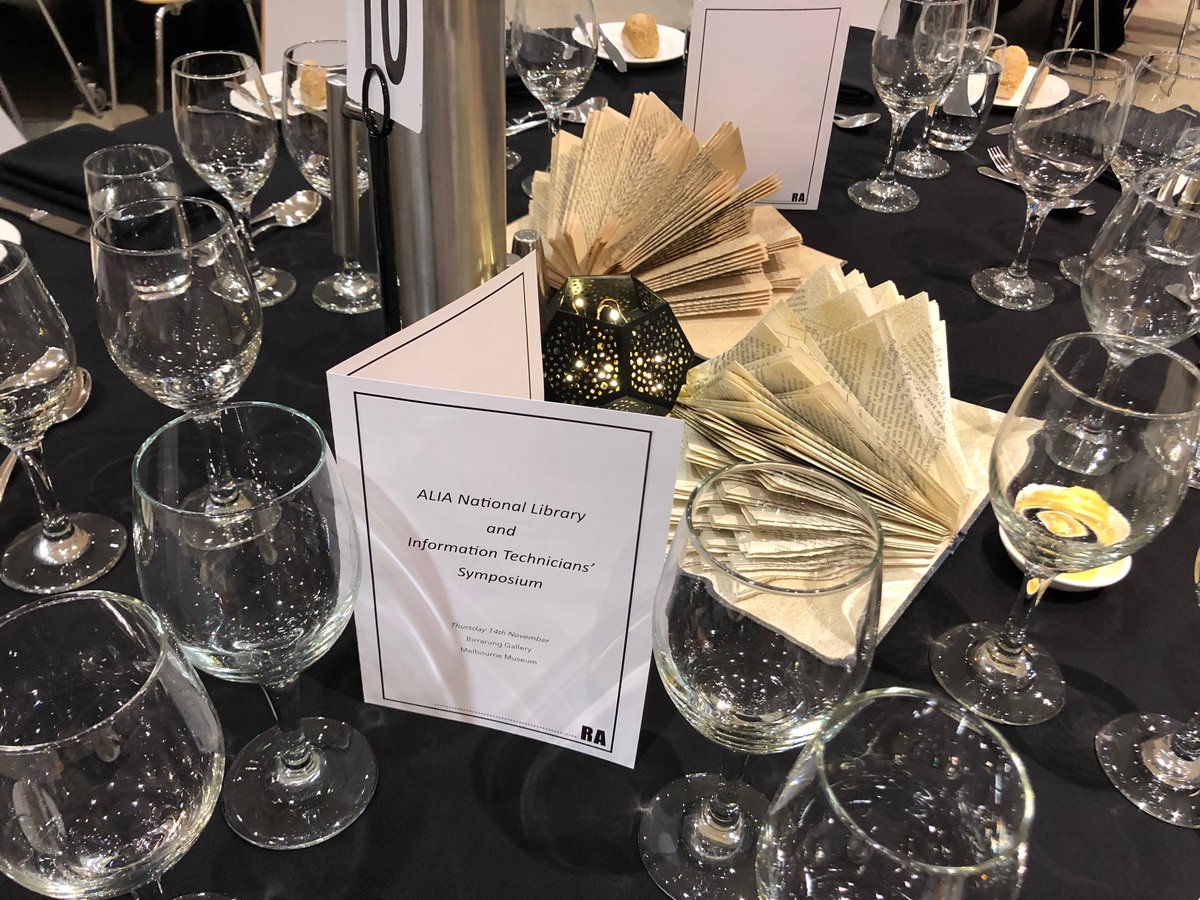 fionajcaskie's tweet image. Our clever #LibTech19 committee members made these gold-sparkled origami centrepieces from books that had been forgotten for some time.