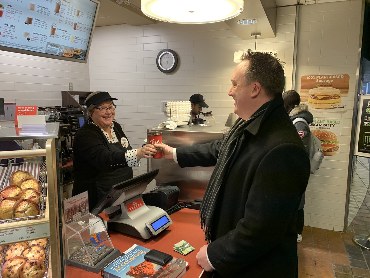 westernuFM's tweet photo. Facilities Management AVPs, Steve MacKay and Elizabeth Krische are serving coffees and smiles in the UCC this morning in support of United Way. Be sure to swing by. Twenty five cents from each large (or bigger) hot beverage is donated to #unitedwayem. #coffeeday #unignorable https://t.co/qTUWMCE7Hw