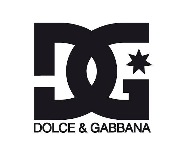 Знак дольче габбана. DC Shoes и Dolce & Gabbana логотипы. Dolce Gabbana логотип бренда. Дольче Габбана значок бренда на одежде. Дольчигабанна логотип.