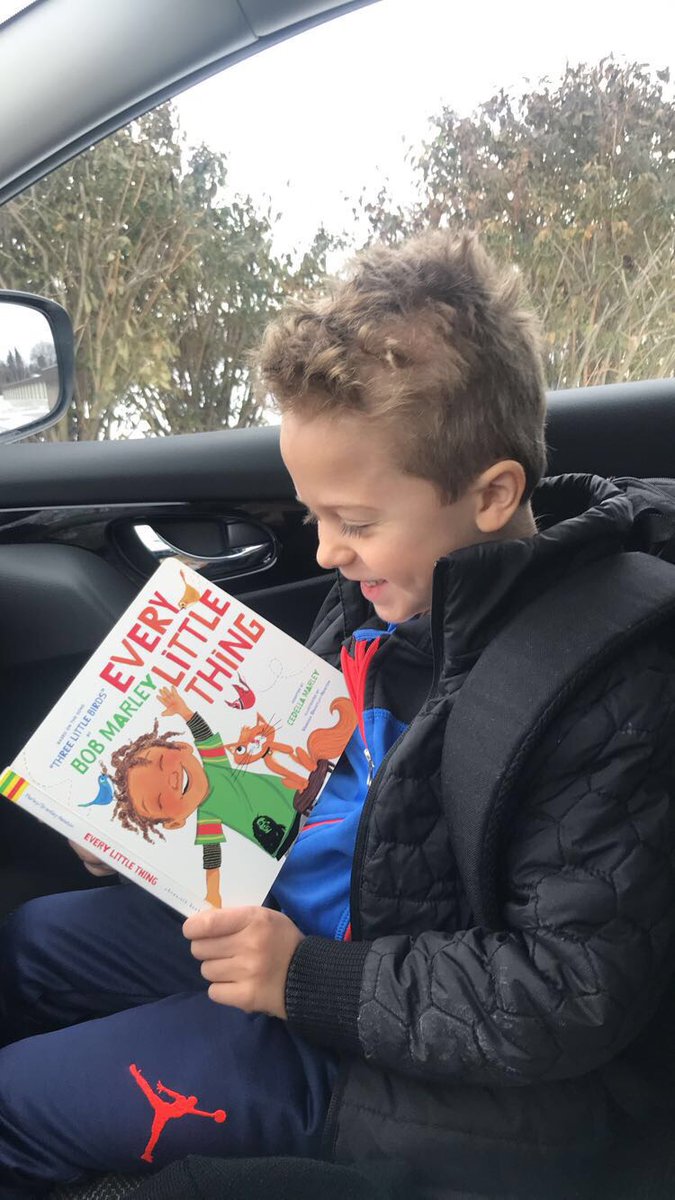 Milton is enjoying a good read while waiting for the school bus ❤️💛💚 <a href="/cedellamarley/">Cedella Marley</a> <a href="/bobmarley/">Bob Marley</a> #marley #goodread #kidsbooks